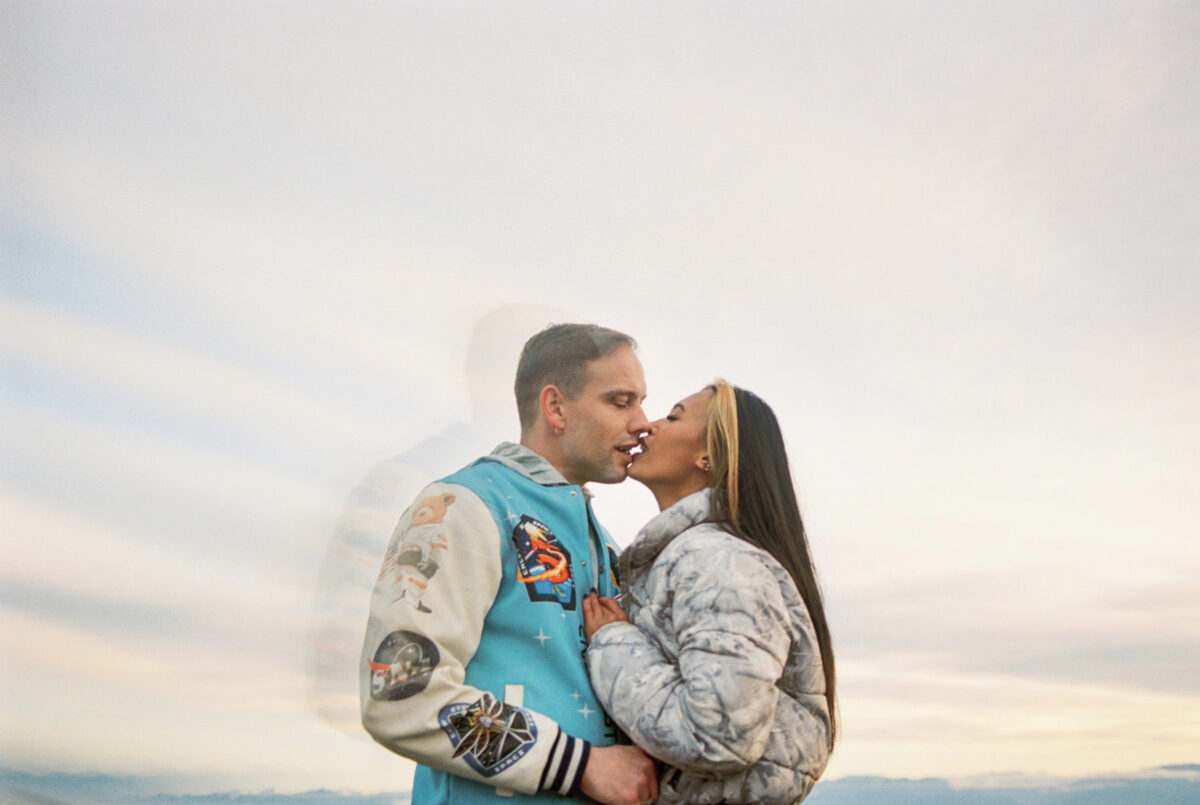 A cinematic portrait of a couple kissing at Macaulay Point Park at the ocean in Victoria BC and Esquimalt. 