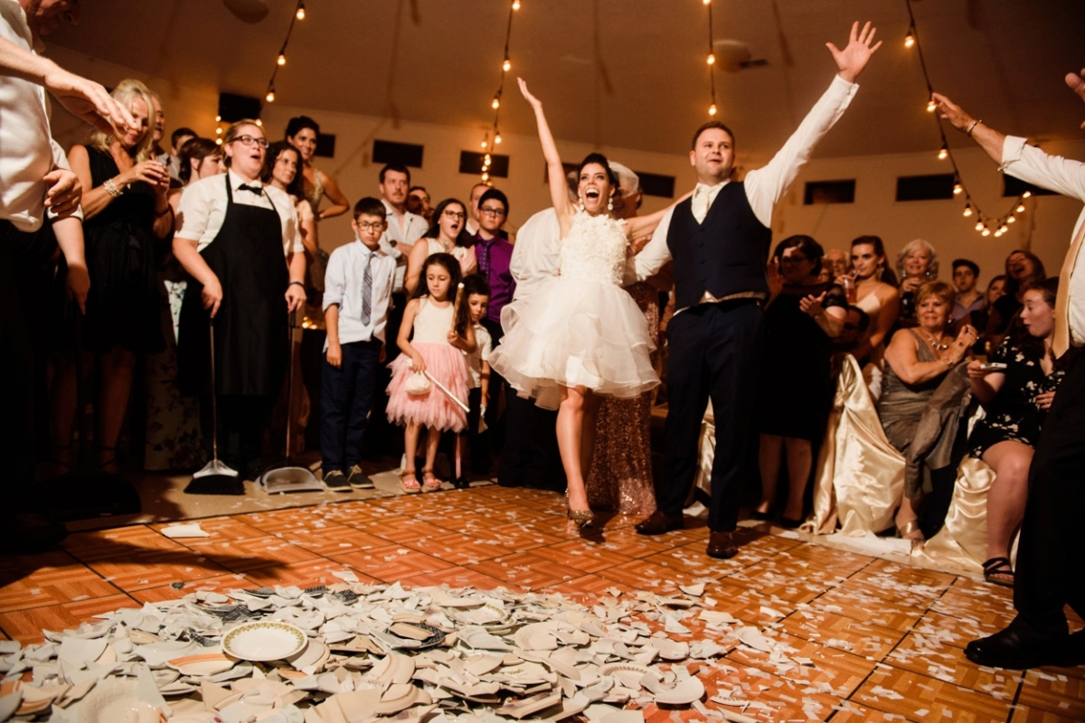 Breaking the plates // Greek Wedding Victoria BC // Photos by FunkyTown Photography Victoria BC