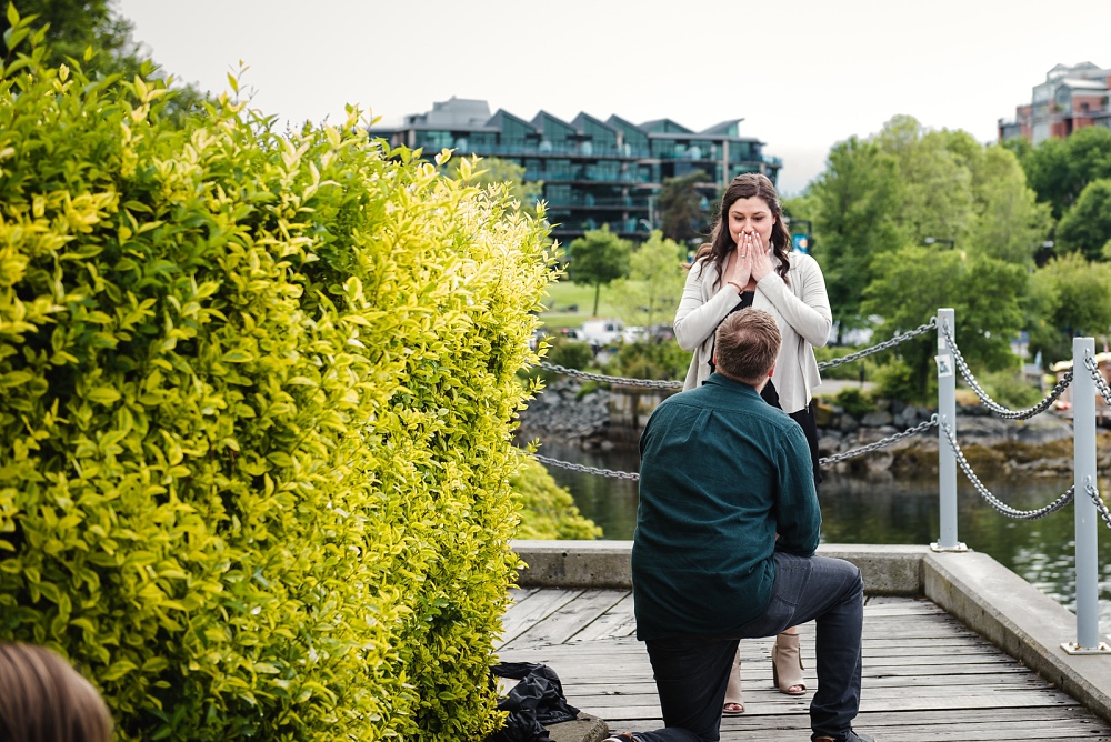 Surprise Engagement Proposal at Fisherman's Wharf in Victoria BC by photographers FunkyTown Photography