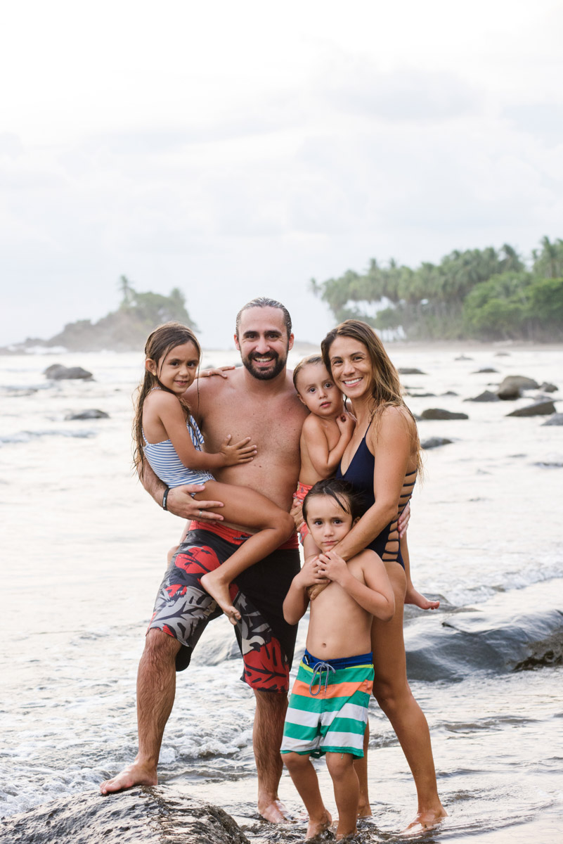 Family portraits at the beach candid documentary photographer