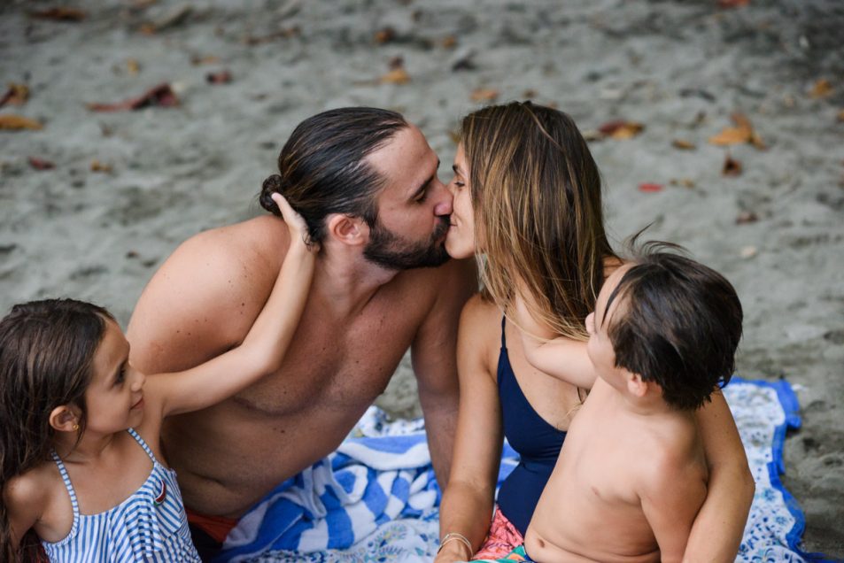 Family portraits at the beach candid documentary photographer