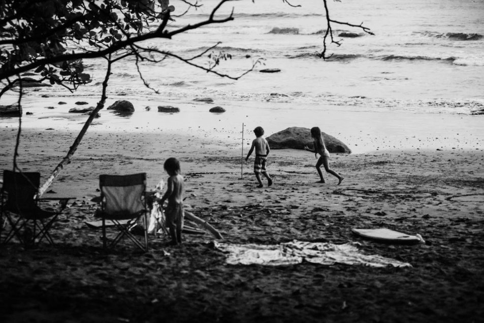 Family portraits at the beach candid documentary photographer