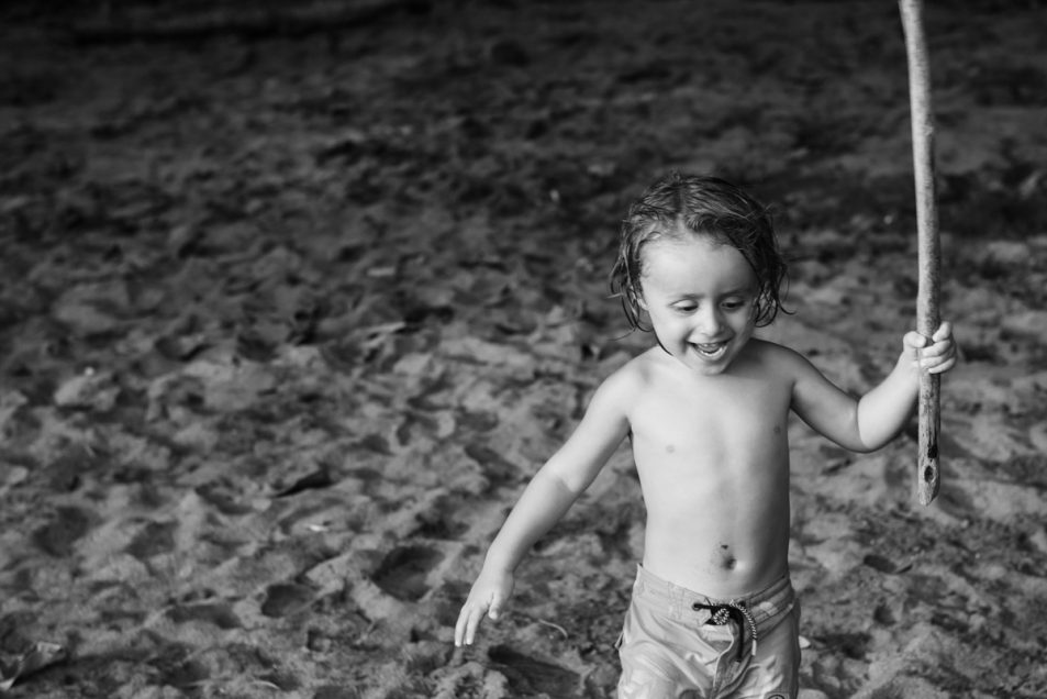Family portraits at the beach candid documentary photographer