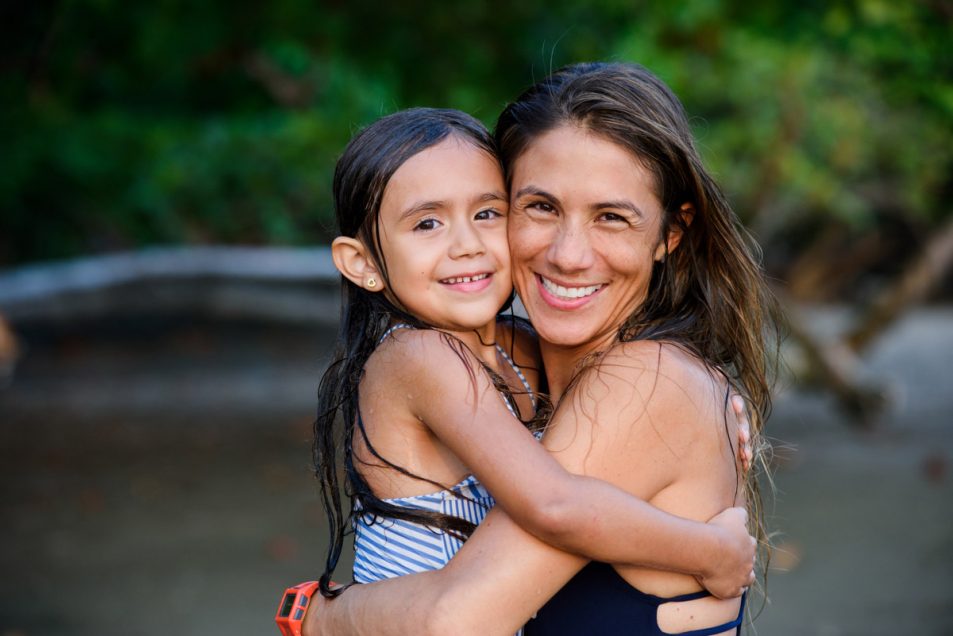 Family portraits at the beach candid documentary photographer