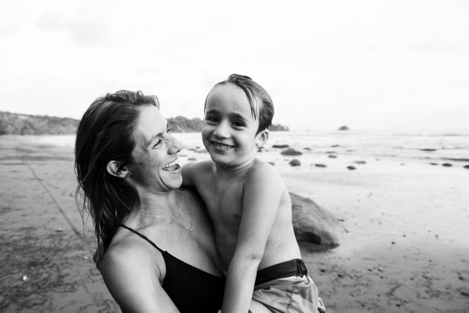 Family portraits at the beach candid documentary photographer