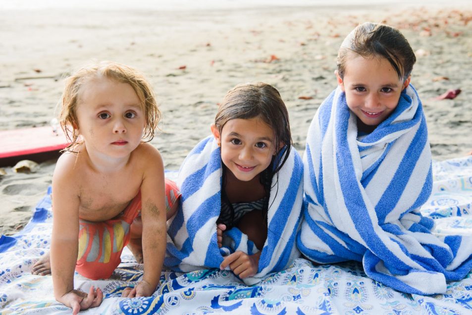 Family portraits at the beach candid documentary photographer