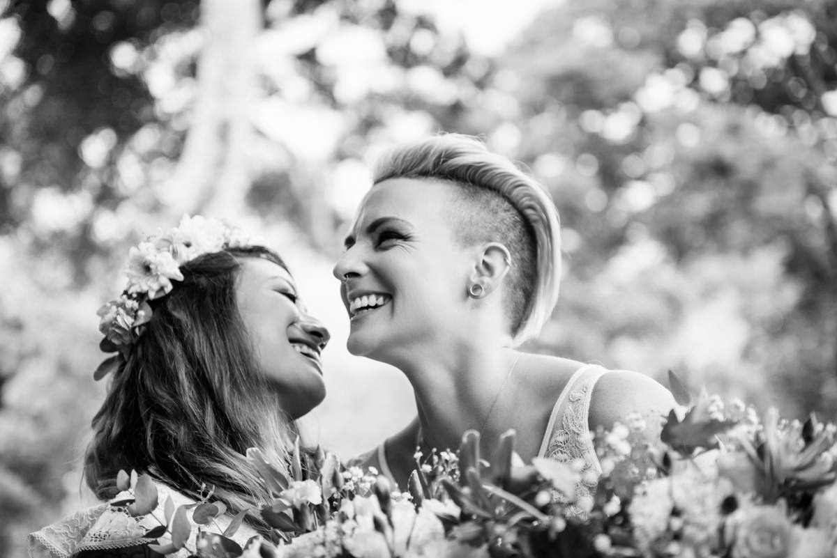 Black and white candid LGBTQ2+ wedding photography