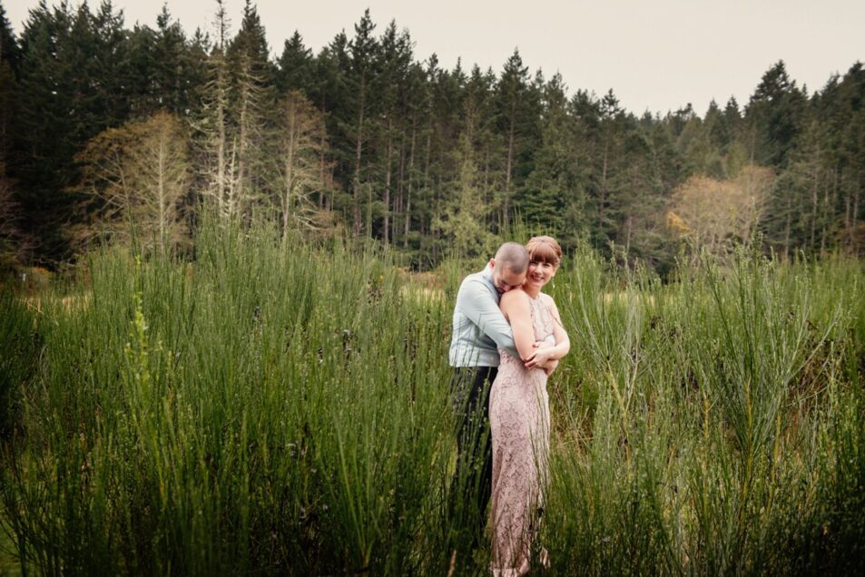 A bride in a pink wedding dress at East Sooke Park in Victoria BC