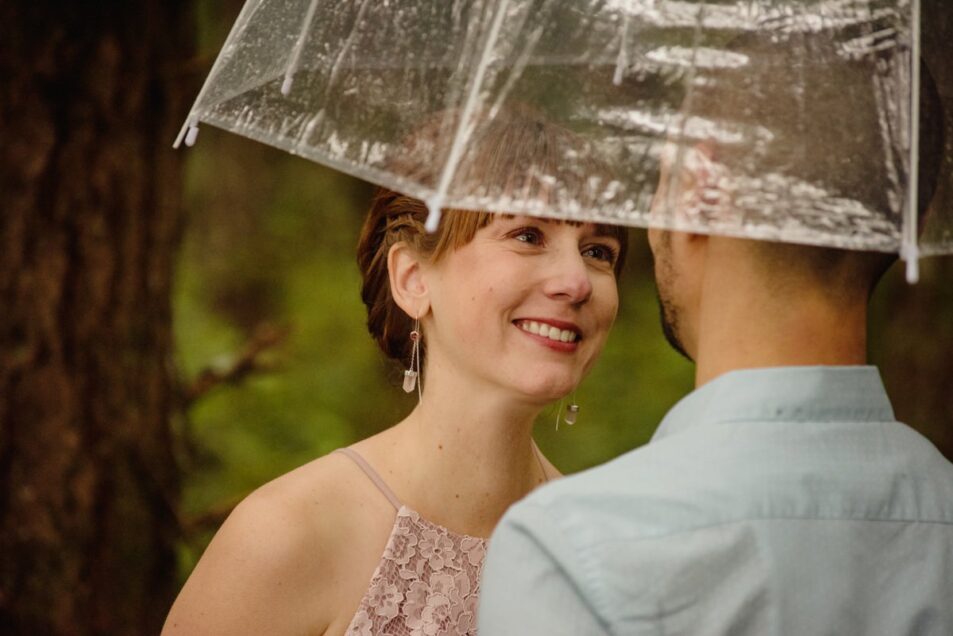 See-through clear umbrellas incorporated into a wedding elopement in Victoria