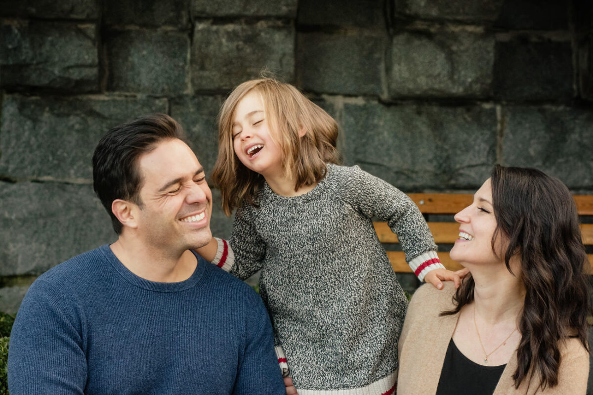 Natural and candid family portraits in Victoria BC at the inner harbour in the winter time.