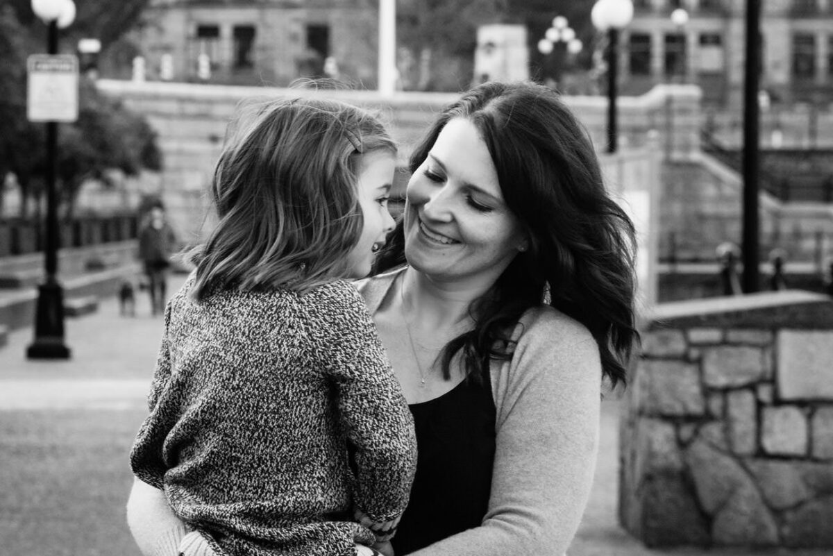 Natural and candid family portraits in Victoria BC at the inner harbour in the winter time.