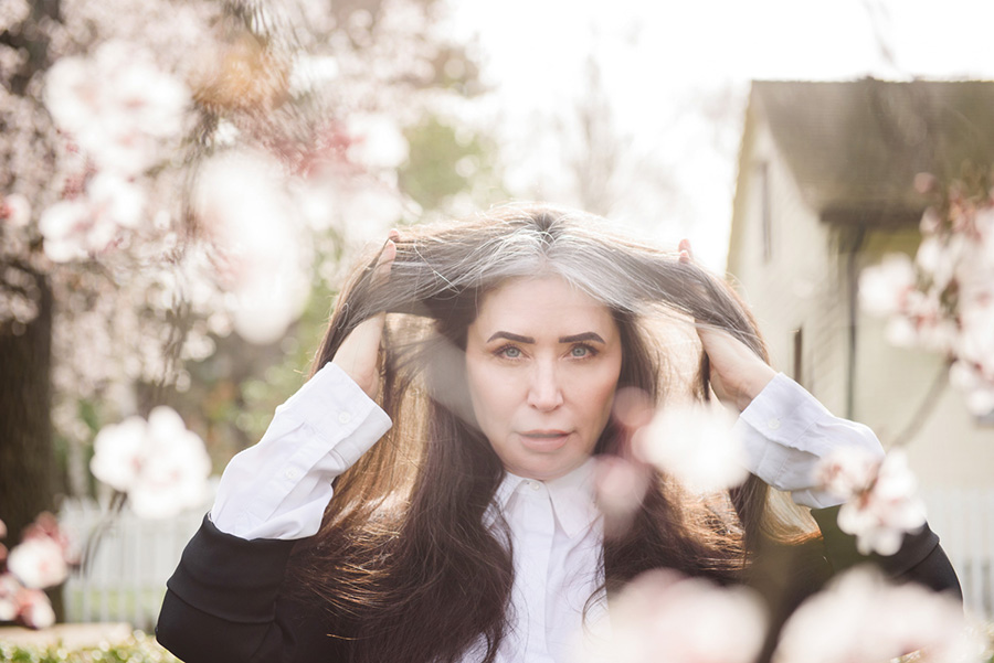 Bespoke fashion portrait in Victoria BC with cherry blossoms