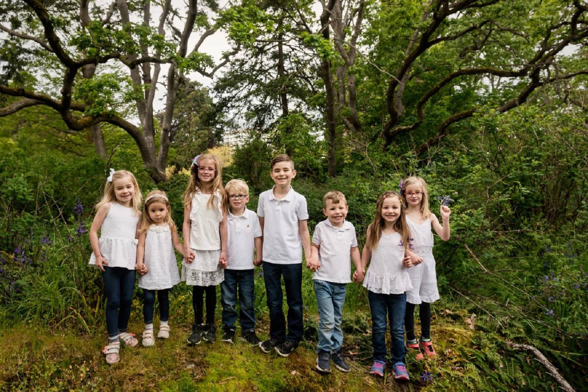 Family reunion with cousins wearing white shirts in Beacon Hill Park