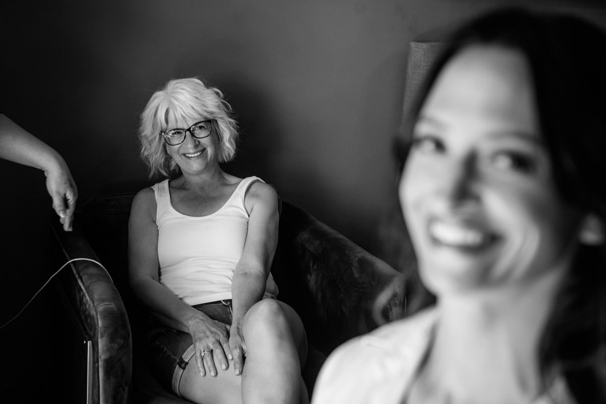 Candid preparation photos at a wedding in black and white