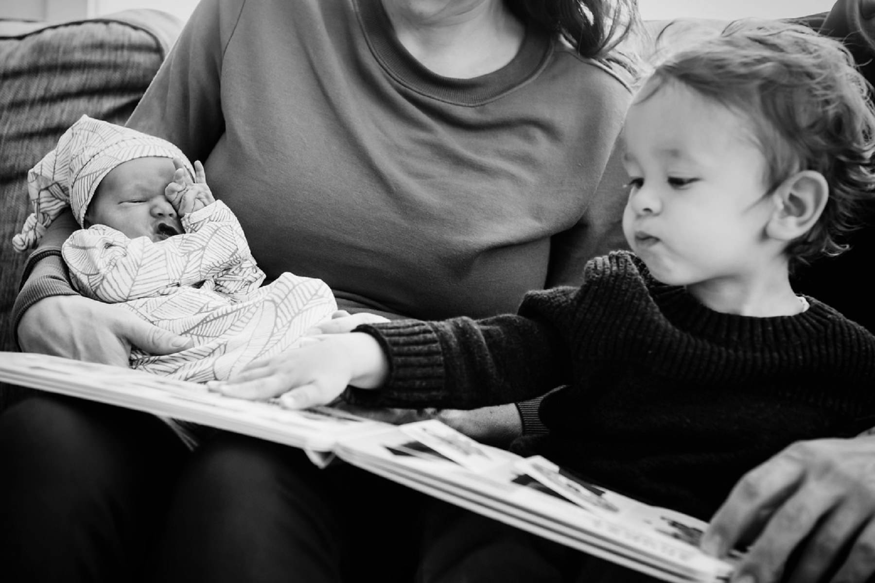 Documentary newborn portrait photography with big brother in a Victoria BC home