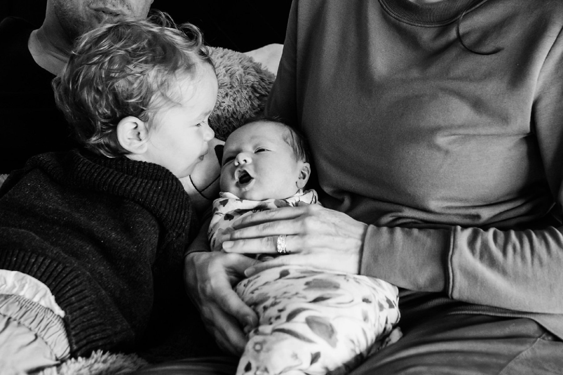 Big brother with his newborn sister in Victoria BC