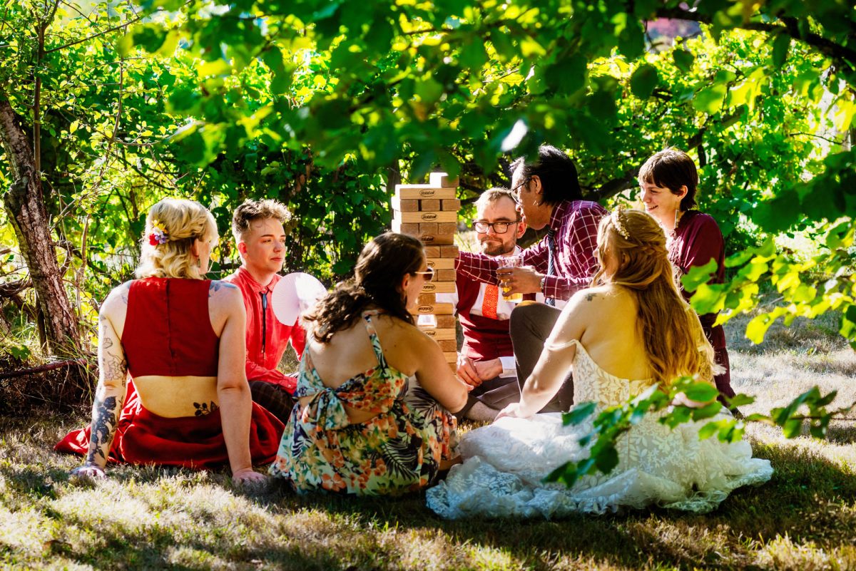 Colourful wedding where people played outdoor games including Jenga