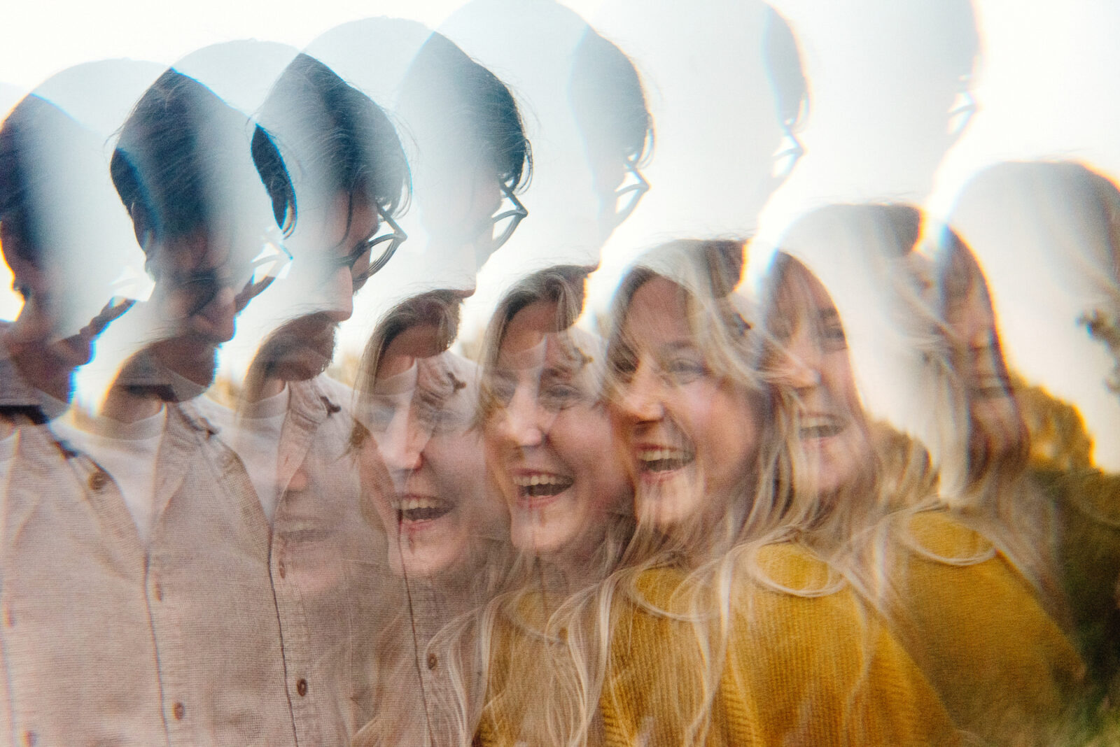 An abstract kaleidoscope portrait of a couple laughing