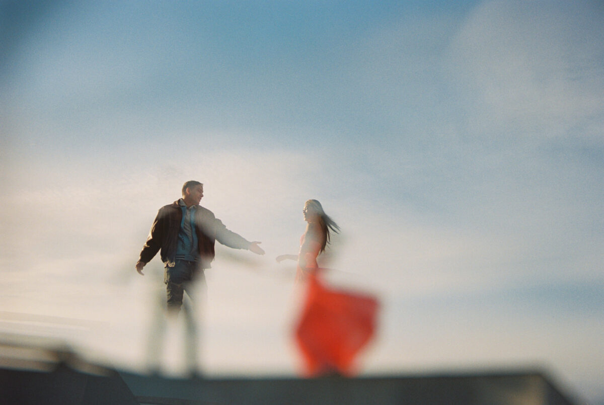 A cinematic creative abstract portrait of a couple dancing along the old military barracks from 1812 in Victoria BC at Macaulay Point Park in Esquimalt. 