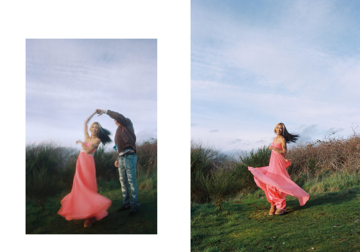 An editorial fashion photo of a fashion model twirling  in a pink dress in Victoria BC. 