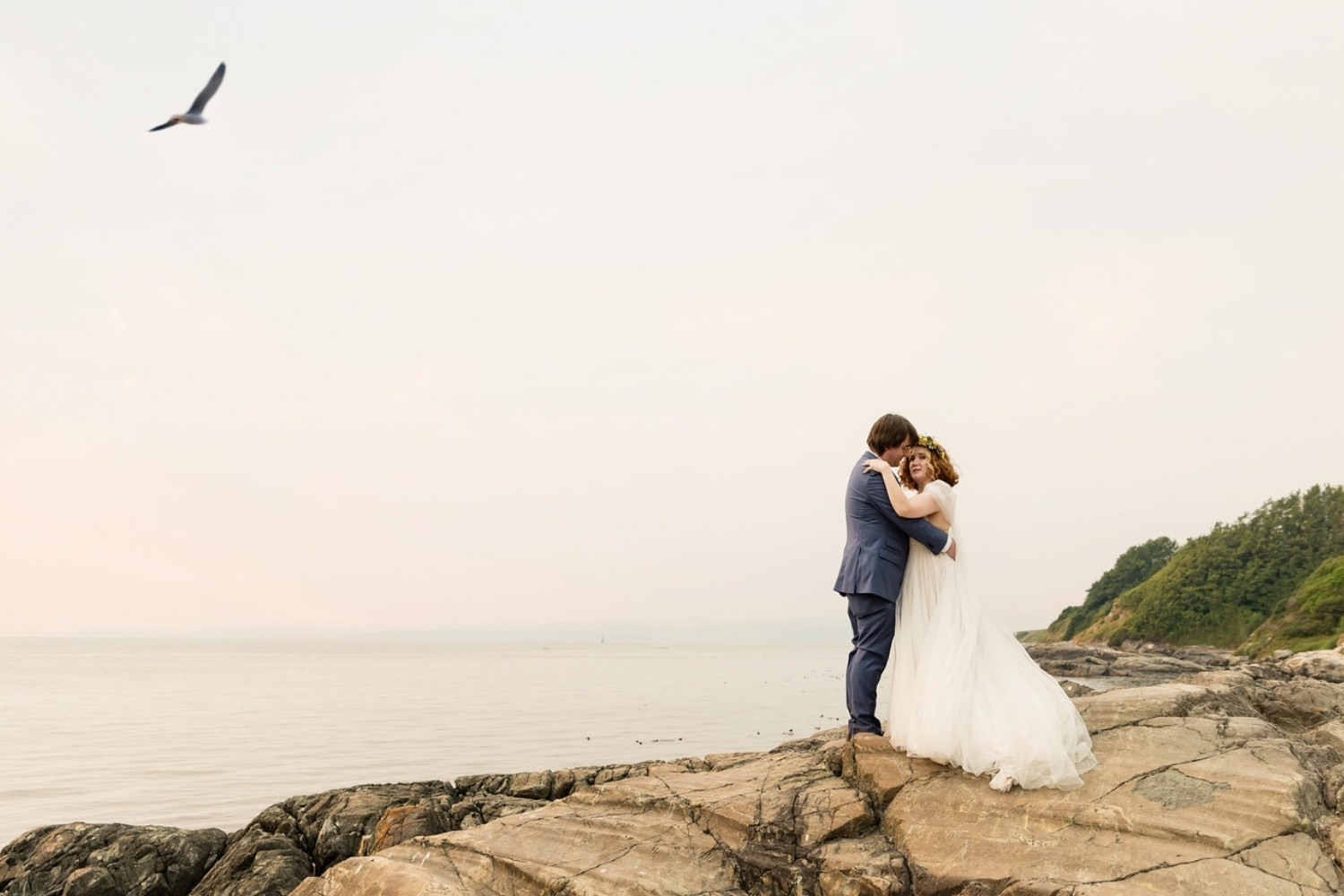Victoria BC wedding portraits at the cliffs near the ocean at mile zero on Dallas Road