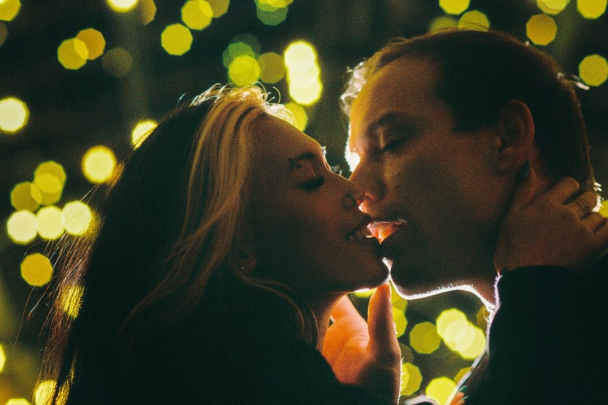 A grainy creative portrait shot on Kodak Ektacolor Pro 800 35mm film in Victoria BC with a couple at night.