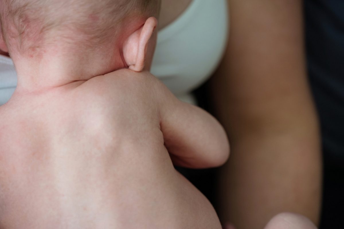 Candid and natural at-home baby photo of the newborn details during a family portrait session in Langford BC