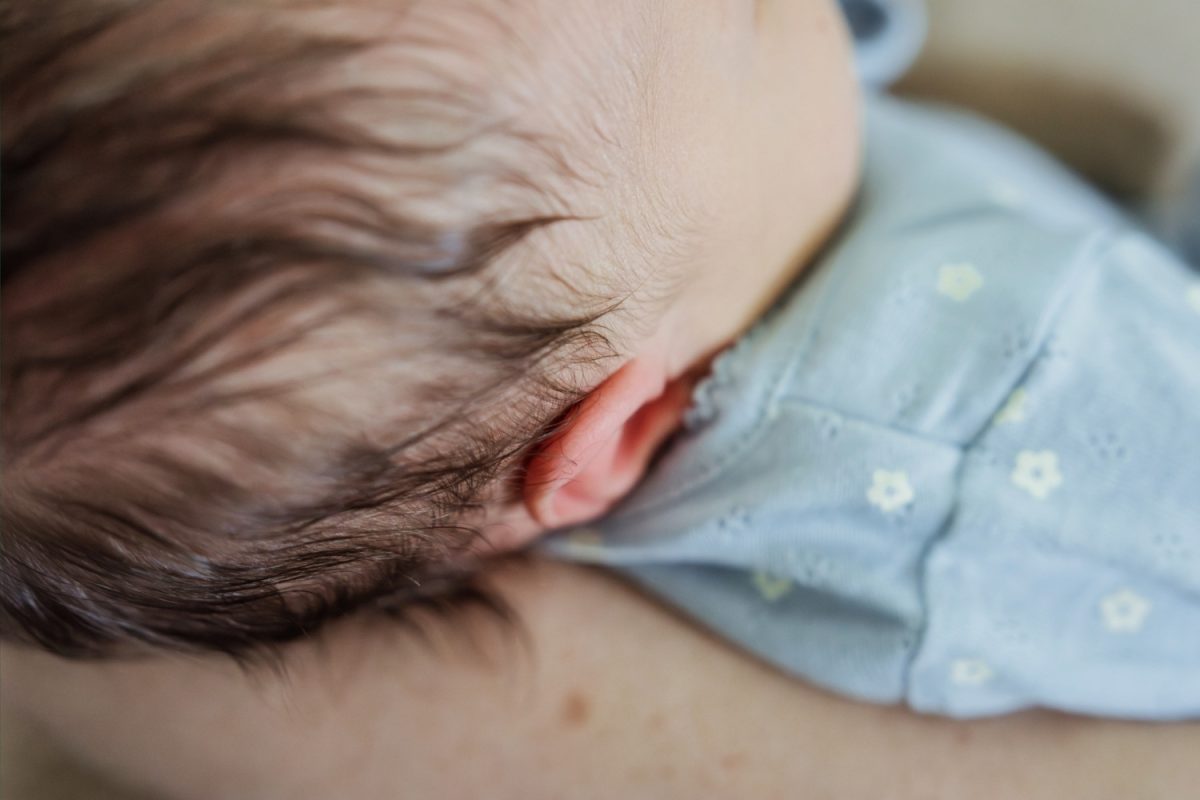 Closeup details of a newborn baby's hairline taken during a newborn portrait session in Victoria BC