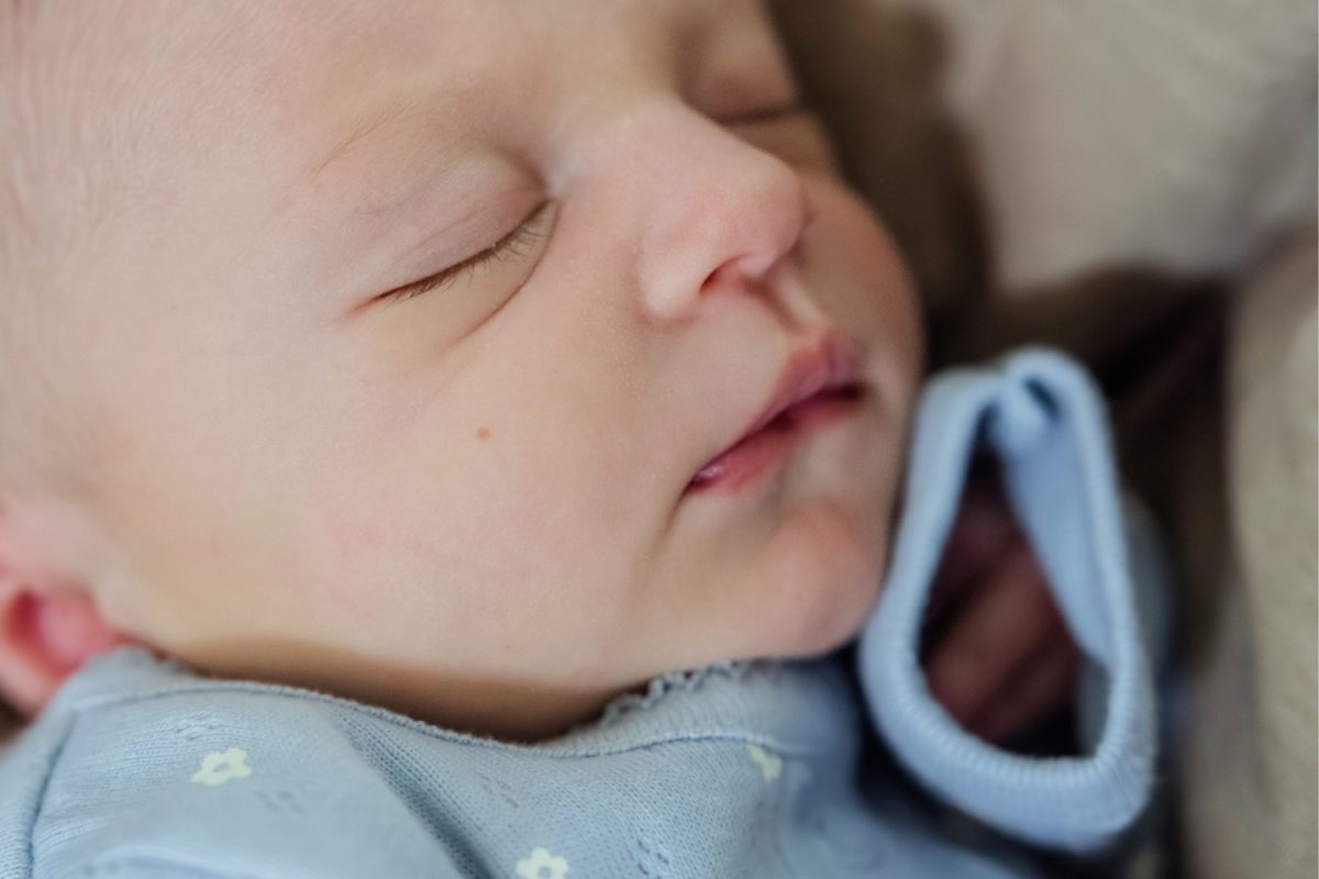 Closeup details of a newborn's mouth and nose.